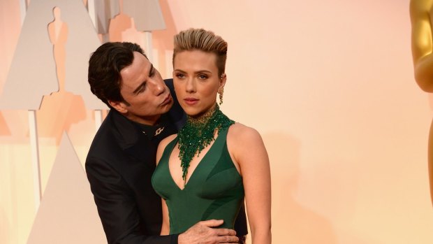 John Travolta and Scarlett Johansson's awkward picture on the Oscars 2015 red carpet.