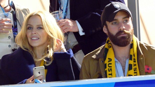 It's official: Kylie Minogue and Joshua Sasse at the Rugby World Cup on Saturday.