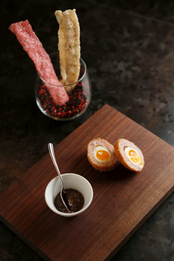 Bar snacks: Scotched quail egg and duck and beetroot crackers are included in the flight.