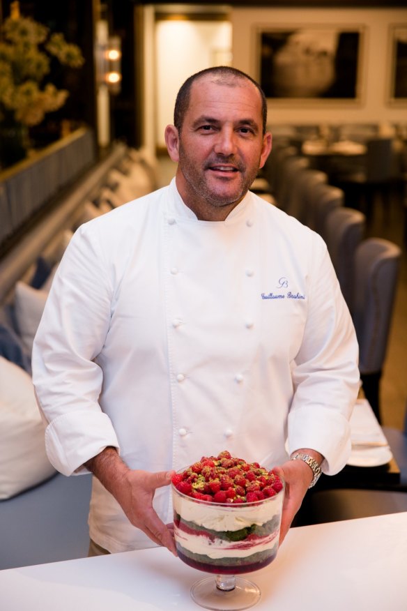 Chef Guillaume Brahimi with his signature dessert at Bistro Guillaume in Sydney.