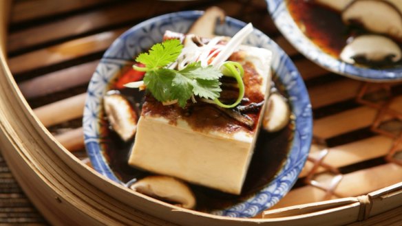 Aromatic steamed silken tofu squares.