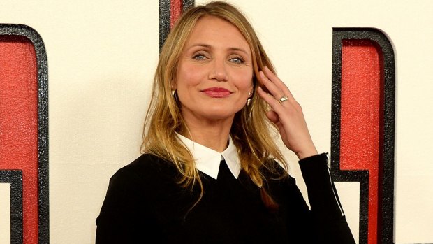 Cameron Diaz, at the <i>Annie</i> premiere, reportedly showing off her engagement bling from rumoured fiance Benji Singer.