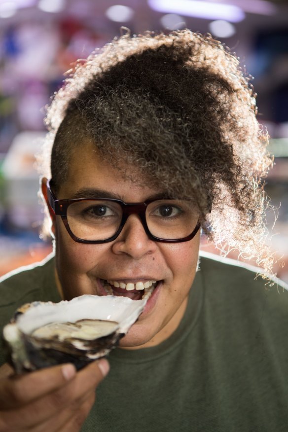 Nornie Bero enjoys oysters at the South Melbourne Market.