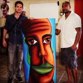 Nicolas Osnovikoff with the self-portrait of Myuran Sukumaran he bought for $500 in 2013.