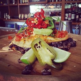 Most moreish: The coconut and black bean quesadilla come with a fresh tomato salsa. avocado and lime.