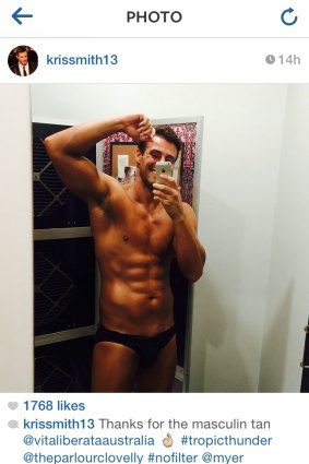 Brown as a berry: Model Kris Smith shoots a selfie from the tanning booth.