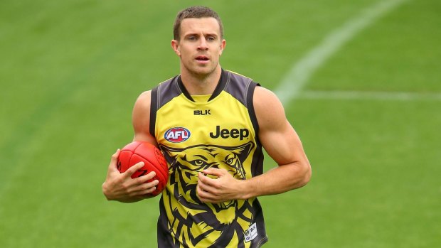 Brett Deledio runs laps at Richmond training on Tuesday.