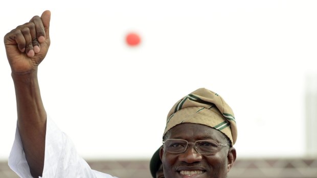 Struggling to face Boko Haram ... Nigerian President Goodluck Jonathan waves to supporters during a rally in Lago on Thursday.