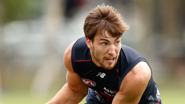 Tough Demon: Jack Viney compares favourably with Joel Selwood.