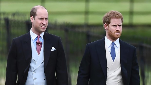 Prince William and Prince Harry, right, arrive at St Mark's Church in Englefield, England, ahead of the wedding of Pippa Middleton and James Matthews, Saturday, May 20, 2017.