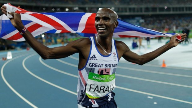 Britain's Mo Farah celebrates winning the gold.
