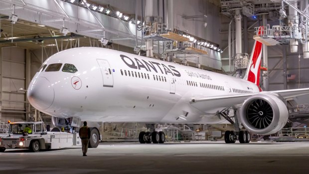 A new Qantas 787-9 Dreamliner rolls out of the Boeing factory in Everett, near Seattle.