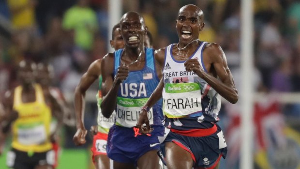 Britain's Mo Farah, right, and United States' Paul Kipkemoi Chelimo, second right, compete in the men's 5000m final.