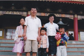 Min “Norman” Lin (second from left) with his wife Yun Li “Lily” Lin and their sons Henry and Terry.