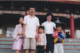 Min "Norman" Lin, 45, (second from left) with his wife Yun Li "Lily" Lin, 43,and their two sons Lins' Henry, 12, and Terry, 9