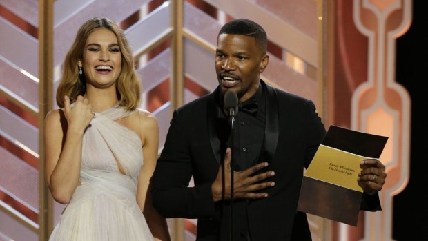 Jamie Foxx and Lily James at the Golden Globe Awards on January 10.