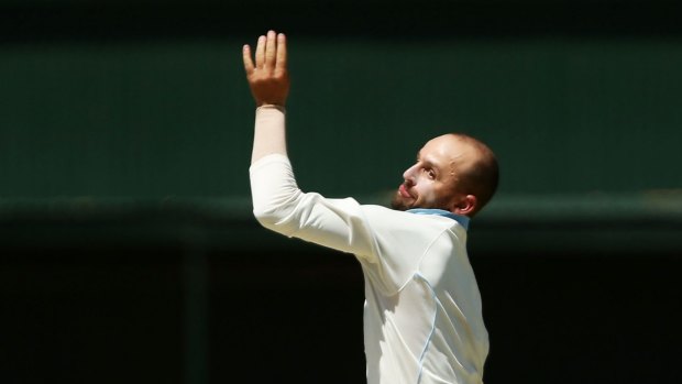 Grand effort: Nathan Lyon bowls for NSW during day two of the Sheffield Shield match against Victoria in Alice Springs.