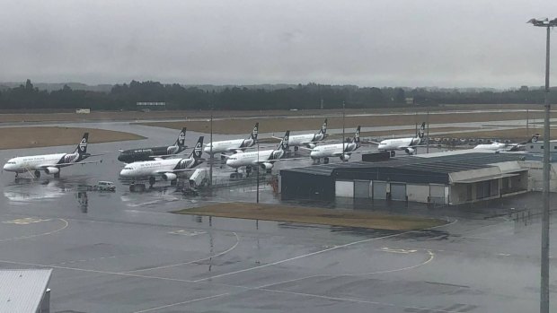 Air New Zealand's domestic and short-haul A320s lined up idle in Christchurch.