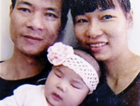 Quyet Nguyen with Phuong Cao, and their baby girl, Sienna.