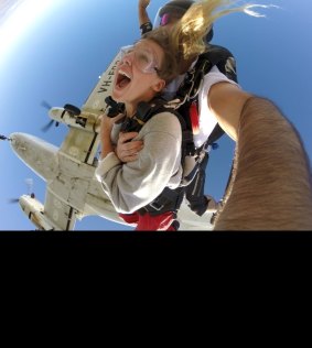 Adrenalin Skydive's Ken Richards performs a tandem skydive.