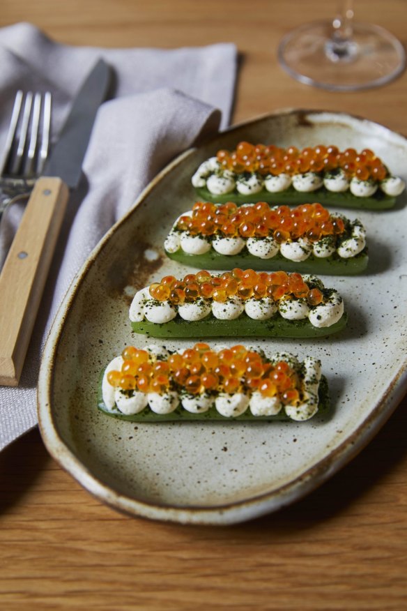Zeitgeisty snacks of cucumber, smoked sour cream and salmon roe at Monopole in Sydney.