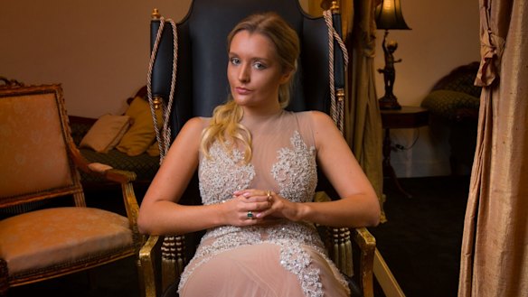 Zofia Krasicki tries on evening gowns at Oglia-Loro Couture in South Yarra for le Bal in Paris.