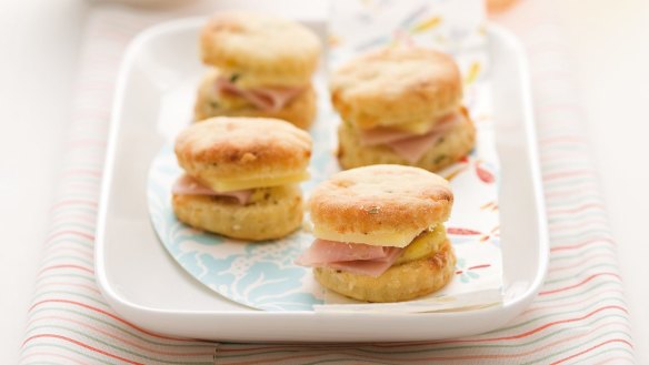 Mini scones sandwiched with ham and cheese.