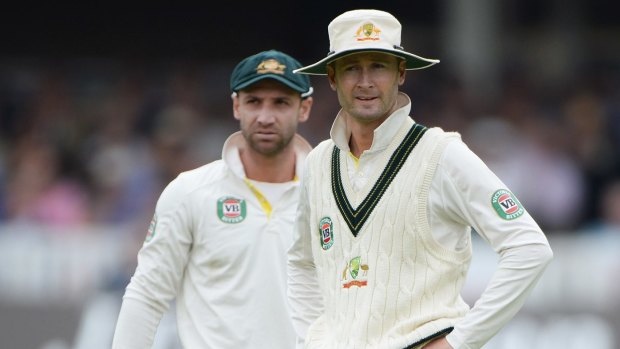 Michael Clarke and Phillip Hughes survey the pitch during a Test match at Lord's in 2013.