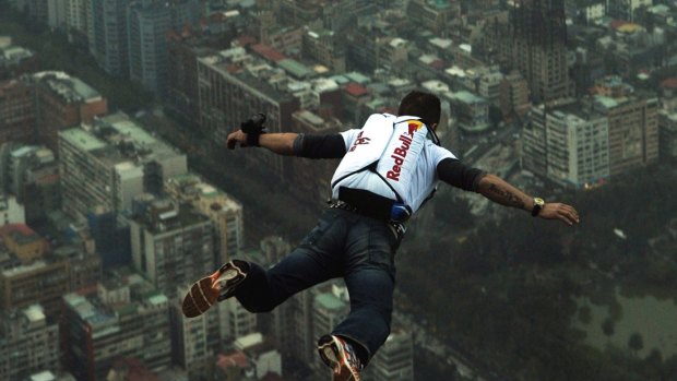 Felix Baumgartner, an Austrian base jumper, makes a jump off the world's tallest completed building, the 508-meter high Taipei 101 Tower,  in Taipei,Taiwan. 
