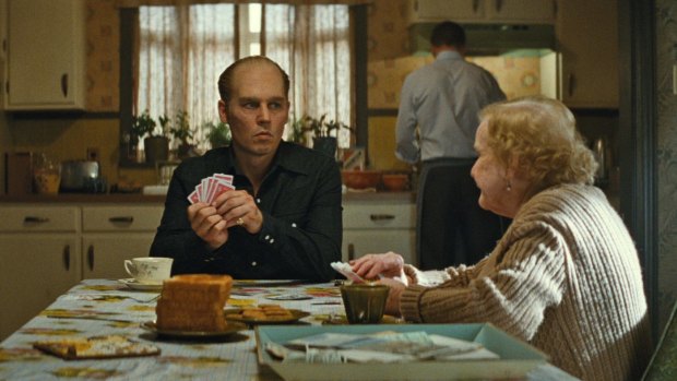 Johnny Depp as ''loving family man'' Whitey Bulger and Mary Klug as Ma Bulger in <i>Black Mass</i>.