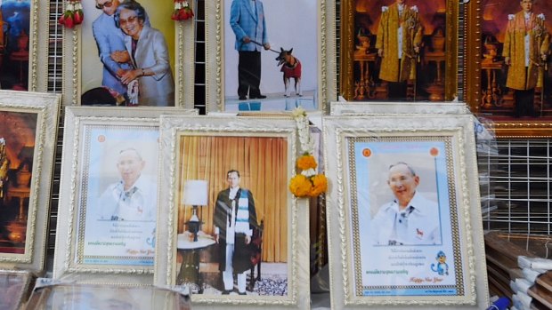 Portraits of King Bhumibol on sale at a Bangkok market stall.