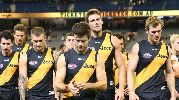 Flagging fortunes: The Tigers leave the field after their loss to Port Adelaide on Saturday.