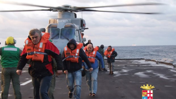Helicopters worked through the night plucking passengers off the stricken vessel and bringing them to safety aboard the 10 or so mercantile ships nearby.