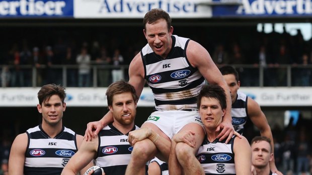 Steve Johnson is chaired from the ground after his last game for Geelong.