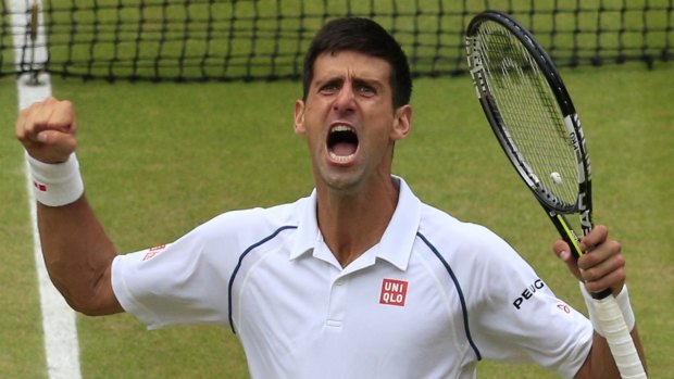 Done it: Novak Djokovic celebrates winning the Wimbledon title against Roger Federer.