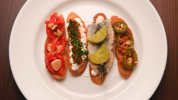 Start with an assortment of crostini.
