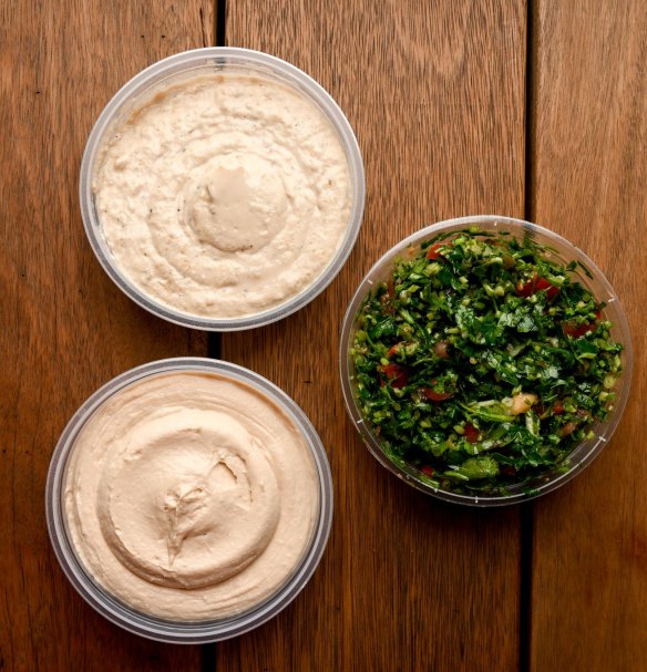 Sides of tabbouleh, hummus and baba ganoush.