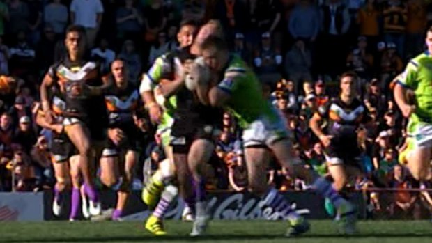 Close contact: Jack Wighton goes in hard.