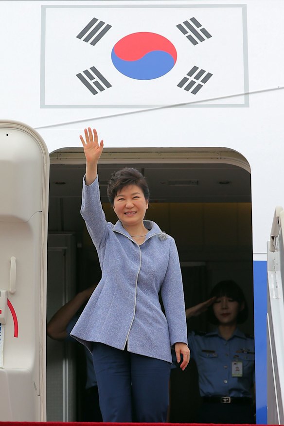 South Korean President Park Geun-hye waves before leaving for China from Seoul Military Airport in Seongnam, South Korea, on Wednesday.