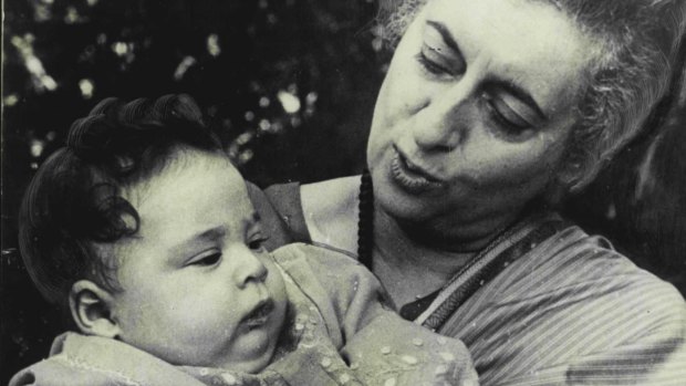 India's then Prime Minister Indira Gandhi fondles her grandson Rahul Gandhi, aged five months, in November,1970.