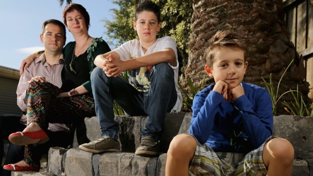 Kon and Bernadette Koliampas with her two sons, Isaak, 11, and Xavier, 8, in Melbourne.
