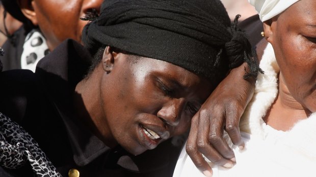 Akon Guode at the funeral of her three children in 2015.