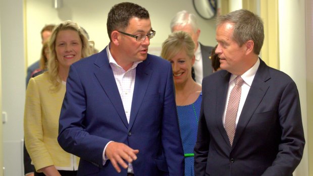 Daniel Andrews talks to Bill Shorten during a tour of Monash Hospital during the Victorian state election campaign in 2014.