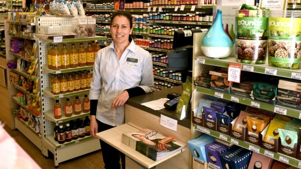 Shop assistant Carina Angelo works in a health food store that has replaced a takeaway joint in Kings Cross.