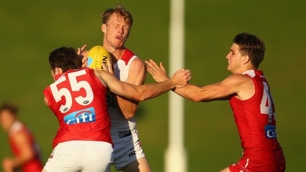 Mills and boom: Callum Mills is tackled during the Swans' intra-club match at Henson Park on Friday night.