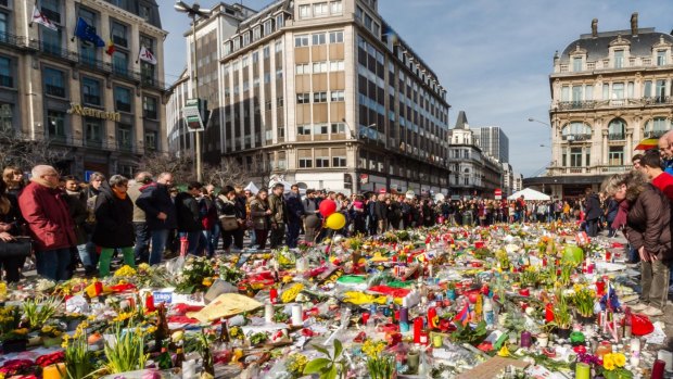 Floral tributes at the Place de la Bourse in Brussels.