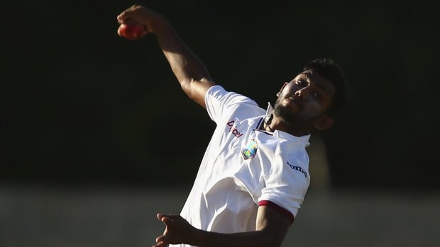 On fire ... Devendra Bishoo of West Indies has ripped through Australia's top order batsmen in a brilliant display of leg-spin bowling during day two of the First Test match in Roseau, Dominica.  