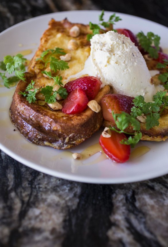 Brioche french toast with and strawberries and tonka bean cream.