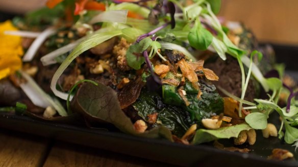 Bo la lot - minced wagyu and betel leaves.