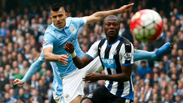 Sergio Aguero scores his fourth goal for Manchester City against Newcastle on Saturday.